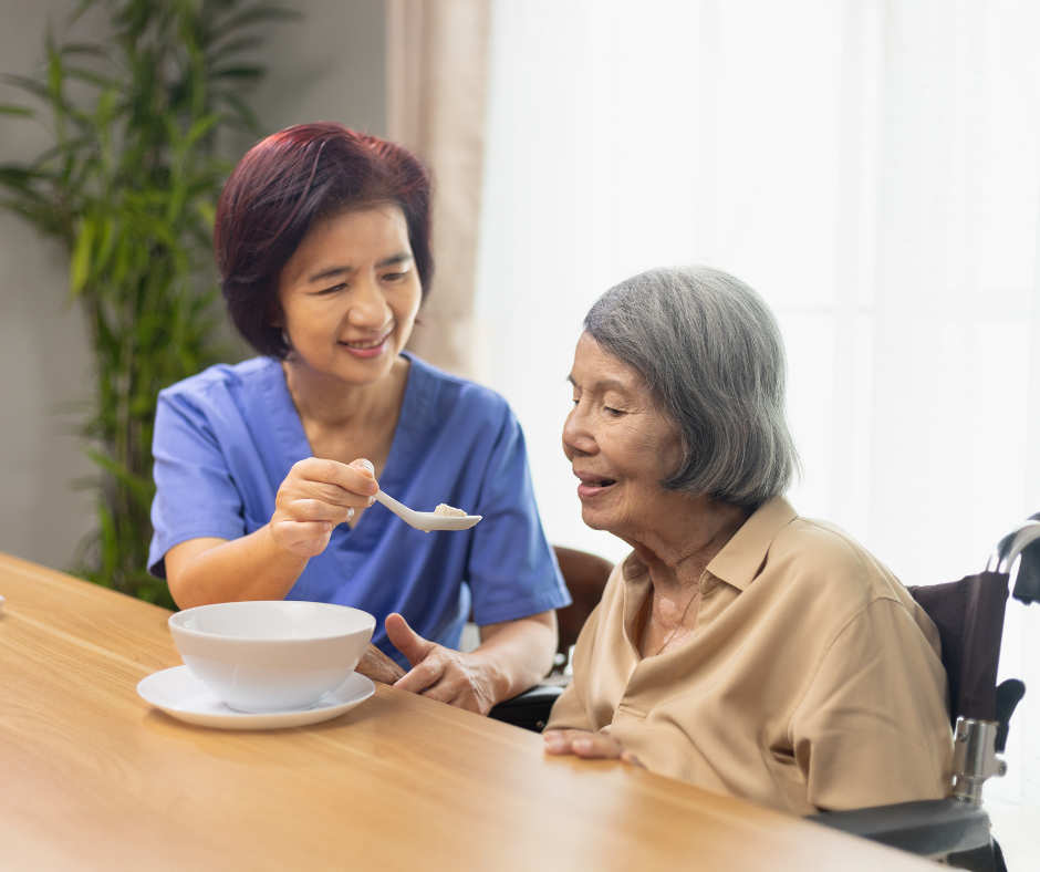 Family member comforting a loved one with advanced dementia.